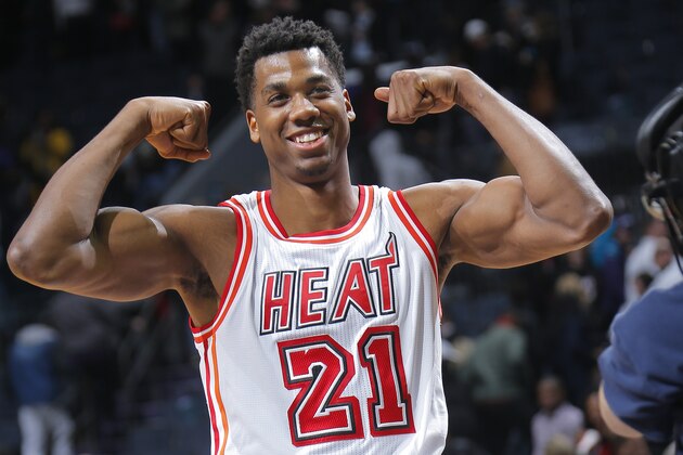 CHARLOTTE, NC - FEBRUARY 5: Hassan Whiteside #21 of the Miami Heat flexes during the game against the Charlotte Hornets on February 5, 2016 at Time Warner Cable Arena in Charlotte, North Carolina. NOTE TO USER: User expressly acknowledges and agrees that, by downloading and or using this Photograph, user is consenting to the terms and condition of the Getty Images License Agreement.  (Photo by Rocky W. Widner/Getty Images)