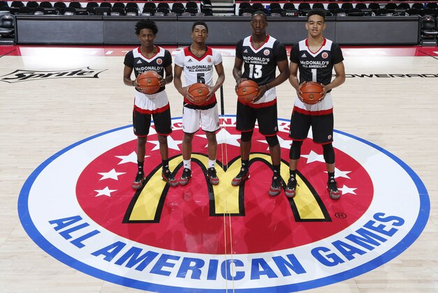 Mar 30, 2016; Chicago, IL, USA; From left to right McDonald's All-Americans De'Aaron Fox (5), Malik Monk (5) Bam Adebayo (13), and Sacha Killeya-Jones (1) who will all be attending the University of Kentucky pose for a group photo before the McDonald's High School All-American Game at the United Center. Mandatory Credit: Brian Spurlock-USA TODAY Sports