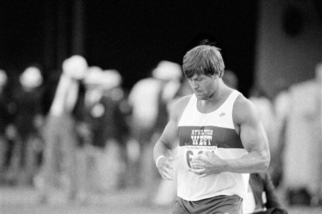 Dave Laut of Goleta, Calif., prepares to throw in the shot put event during the U.S. Track and Field Trials in Los Angeles, Calif., June 23, 1984. Laut threw 70 feet and a quarter inch, gaining him a berth on the U.S. Olympic Team. (AP Photo/Doug Pizac)
