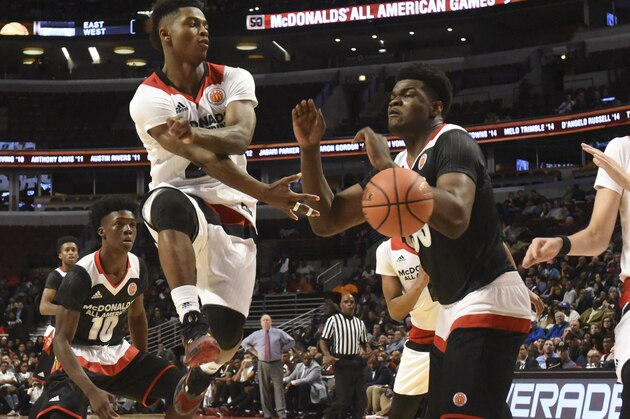 CHICAGO, IL - MARCH 30: Alterique Gilbert #24 of the West team passes around Udoka Azubuike #35 of the East  team during the 2016 McDonalds's All American Game on March 30, 2016 at the United Center in Chicago, Illinois. The West won 114-107. (Photo by David Banks/Getty Images)