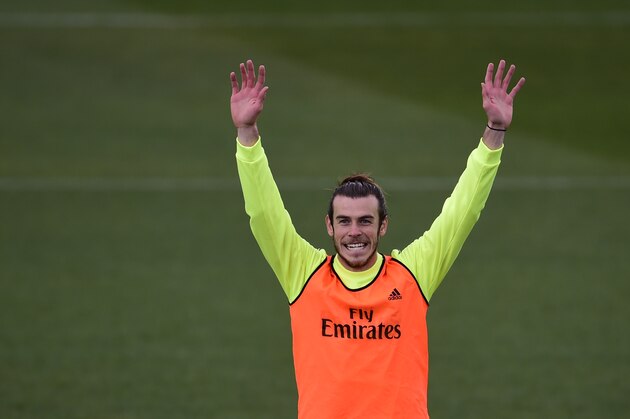 Real Madrid's Welsh forward Gareth Bale gestures during a training session at Valdebebas Sport City in Madrid on March 19, 2016 on the eve of their Liga football match against Sevilla. / AFP / PIERRE-PHILIPPE MARCOU        (Photo credit should read PIERRE-PHILIPPE MARCOU/AFP/Getty Images)