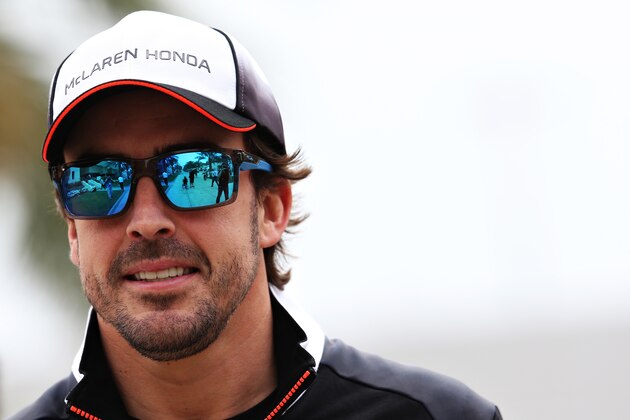 SAKHIR, BAHRAIN - MARCH 31: Fernando Alonso of Spain and McLaren Honda in the Paddock during previews ahead of the Bahrain Formula One Grand Prix at Bahrain International Circuit on March 31, 2016 in Sakhir, Bahrain.  (Photo by Mark Thompson/Getty Images)