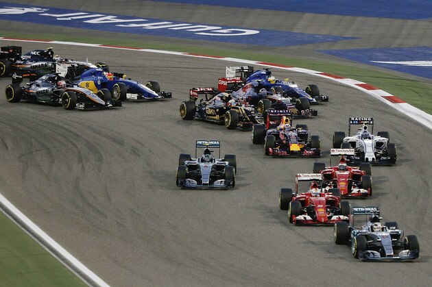Mercedes driver Lewis Hamilton of Britain leads the field after the start of the Bahrain Formula One Grand Prix at the Formula One Bahrain International Circuit in Sakhir, Bahrain, Sunday, April 19, 2015. (AP Photo/Hassan Ammar)