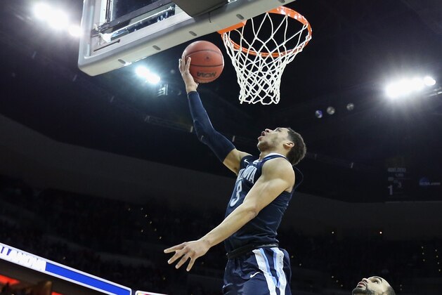 LOUISVILLE, KY - MARCH 26:  Josh Hart #3 of the Villanova Wildcats drives to the basket in the second half against Perry Ellis #34 of the Kansas Jayhawks during the 2016 NCAA Men's Basketball Tournament South Regional at KFC YUM! Center on March 26, 2016 in Louisville, Kentucky.  (Photo by Andy Lyons/Getty Images)