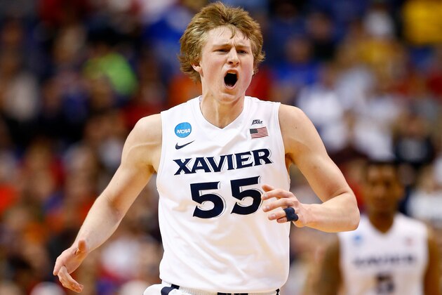 ST LOUIS, MO - MARCH 20:  J.P. Macura #55 of the Xavier Musketeers reacts after a play in the second half against the Wisconsin Badgers during the second round of the 2016 NCAA Men's Basketball Tournament at Scottrade Center on March 20, 2016 in St Louis, Missouri.  (Photo by Jamie Squire/Getty Images)