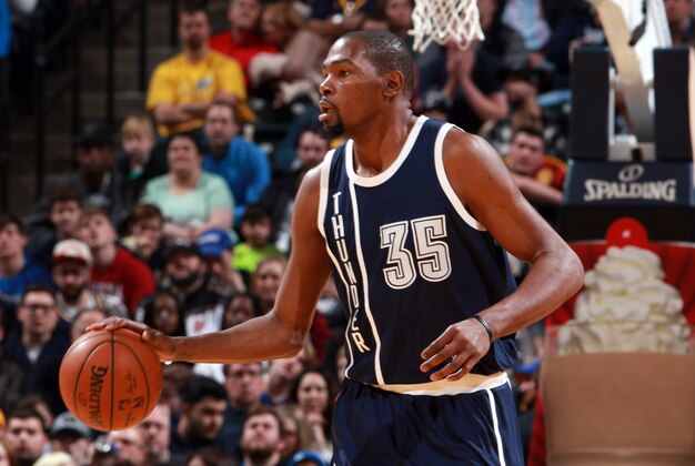 Mar 19, 2016; Indianapolis, IN, USA; Oklahoma City Thunder forward Kevin Durant (35) brings the ball up court against the Indiana Pacers at Bankers Life Fieldhouse. Oklahoma City defeats Indiana 115-111. Mandatory Credit: Brian Spurlock-USA TODAY Sports