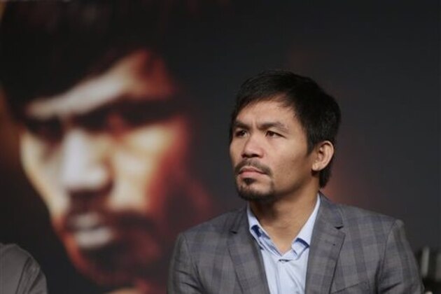 Manny Pacquiao listens during a news conference to promote an upcoming boxing match Thursday, Jan. 21, 2016, in New York. Pacquiao is scheduled to fight Timothy Bradley on April 9, 2016,  in Las Vegas.  (AP Photo/Frank Franklin II)