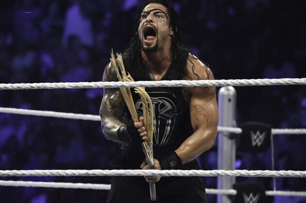 MIAMI, FL- SEPTEMBER 01: Roman Reigns reacts during the WWE Smackdown on September 1, 2015 at the American Airlines Arena in Miami, Florida.  (Photo by Ron ElkmanSports Imagery/Getty Images)