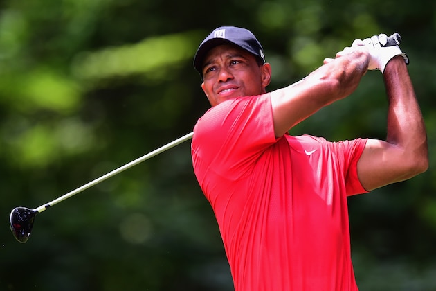 GREENSBORO, NC - AUGUST 23:  Tiger Woods tees off on the second hole during the final round of the Wyndham Championship at Sedgefield Country Club on August 23, 2015 in Greensboro, North Carolina.  (Photo by Jared C. Tilton/Getty Images)