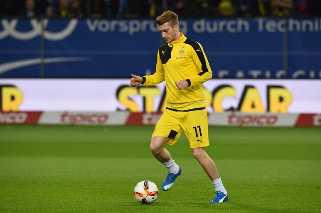Dortmund's striker Marco Reus warms up prior to the German first division football Bundesliga match between Hamburg SV and Borussia Dortmund in Hamburg, northern Germany on November 20, 2015. AFP PHOTO / CARMEN JASPERSEN

RESTRICTIONS: DURING MATCH TIME: DFL RULES TO LIMIT THE ONLINE USAGE TO 15 PICTURES PER MATCH AND FORBID IMAGE SEQUENCES TO SIMULATE VIDEO. 
==RESTRICTED TO EDITORIAL USE ==
FOR FURTHER QUERIES PLEASE CONTACT THE DFL DIRECTLY AT + 49 69 650050.        (Photo credit should read CARMEN JASPERSEN/AFP/Getty Images)