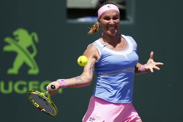 Mar 31, 2016; Key Biscayne, FL, USA; Svetlana Kuznetsova hits a forehand against Timea Bacsinszky (not pictured) during a women's singles semifinal on day eleven of the Miami Open at Crandon Park Tennis Center. Mandatory Credit: Geoff Burke-USA TODAY Sports
