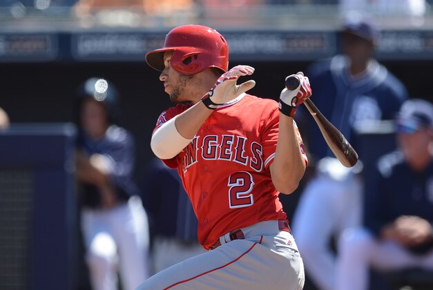 Mar 27, 2016; Peoria, AZ, USA; Los Angeles Angels shortstop Andrelton Simmons (2) hits an RBI single during the first inning against the San Diego Padres at Peoria Sports Complex. Mandatory Credit: Joe Camporeale-USA TODAY Sports