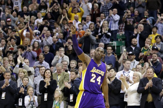 Los Angeles Lakers forward Kobe Bryant (24) waves as he walks off the court during the second half of an NBA basketball game against the Utah Jazz Monday, March 28, 2016, in Salt Lake City. The Jazz won 123-75. (AP Photo/Rick Bowmer)