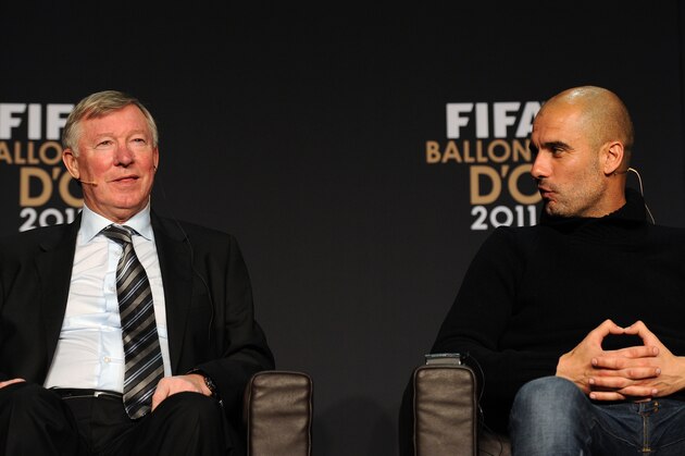 Nominees for the Fifa World coach of the Year for Men’s Football, Sir Alex Ferguson (L), manager of Manchester United and Barcelona's Spanish coach Pep Guardiola share a joke during a press conference prior to the FIFA Ballon d'Or ceremony on January 9, 2012 at the Kongresshaus in Zurich. AFP PHOTO / FRANCK FIFE (Photo credit should read FRANCK FIFE/AFP/Getty Images)