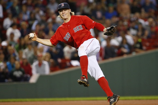 Boston Red Sox second baseman Brock Holt decides not to throw the ball to first after fielding an infield hit by Philadelphia Phillies' Aaron Altherr during the sixth inning of a baseball game at Fenway Park in Boston Friday, Sept. 4, 2015. (AP Photo/Winslow Townson) Boston Red Sox second baseman Brock Holt decides not to throw the ball to first after fielding an infield hit by Philadelphia Phillies' Aaron Altherr during the sixth inning of a baseball game at Fenway Park in Boston Friday, Sept. 4, 2015. (AP Photo/Winslow Townson)