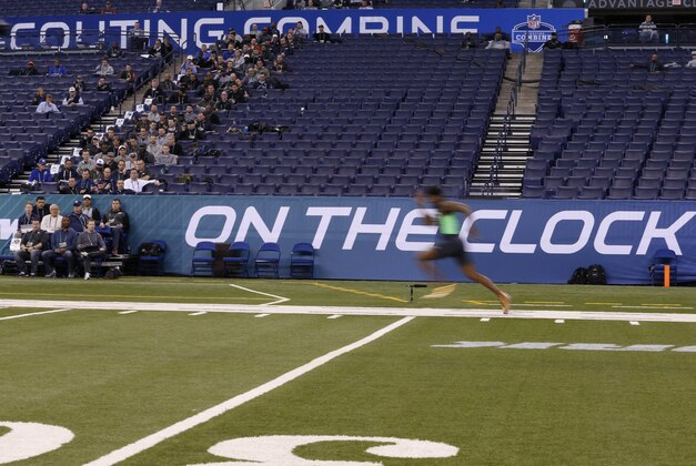 Feb 29, 2016; Indianapolis, IN, USA; Texas A&M defensive back Brandon Williams (C) runs the 40 yard dash during the 2016 NFL Scouting Combine at Lucas Oil Stadium. Mandatory Credit: Brian Spurlock-USA TODAY Sports