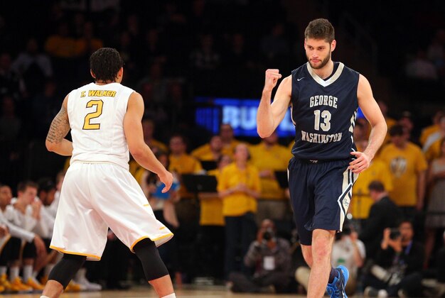 Mar 31, 2016; New York, NY, USA; George Washington Colonials guard Patricio Garino (13) reacts in front of Valparaiso Crusaders guard Tevonn Walker (2) during the first half of the championship game of the 2016 NIT basketball tournament at Madison Square Garden. Mandatory Credit: Brad Penner-USA TODAY Sports