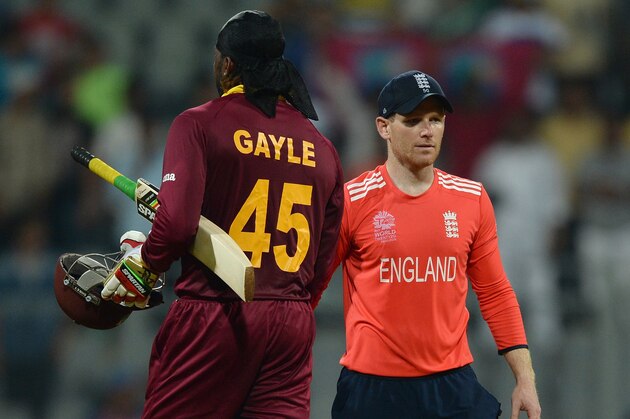 MUMBAI, INDIA - MARCH 16:  Chris Gayle of the West Indies shakes hands with England captain Eoin Morgan after winning the ICC World Twenty20 India 2016 Super 10s Group 1 match between West Indies and England at Wankhede Stadium on March 16, 2016 in Mumbai, India.  (Photo by Gareth Copley/Getty Images)