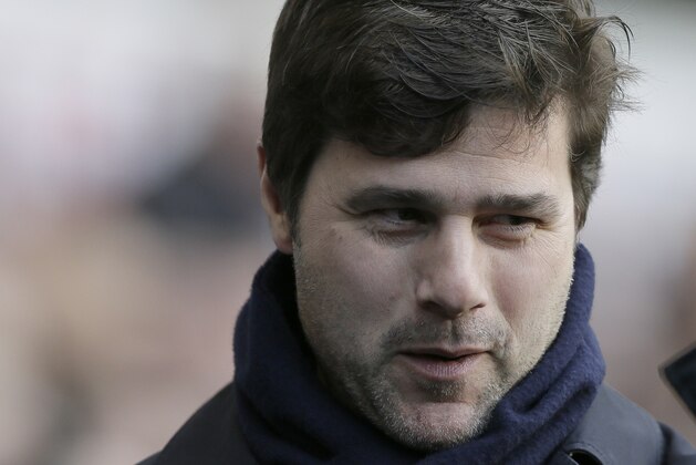 Tottenham manager Mauricio Pochettino smiles before the English Premier League soccer match between Tottenham Hotspur and Bournemouth at White Hart Lane in London, Sunday March 20, 2016. (AP Photo/Tim Ireland)