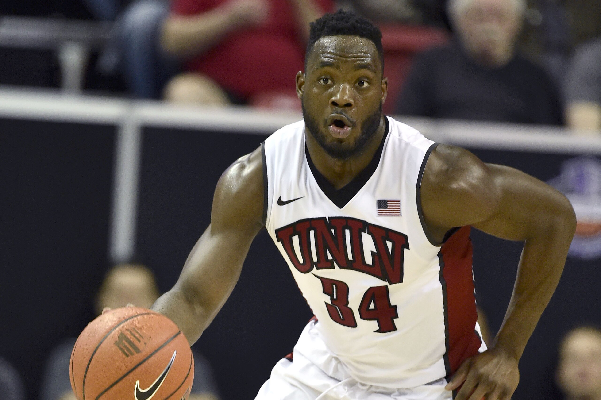 UNLV's Ike Nwamu (34) brings the ball down court against Air Force during an NCAA college basketball game at the Mountain West Conference men's tournament Wednesday, March 9, 2016, in Las Vegas. UNLV won 108-102 after triple overtime. (AP Photo/David Becker)