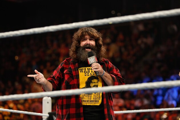 NEW YORK, NY - AUGUST 23: Mick Foley greets the audience at WWE SummerSlam 2015 at Barclays Center of Brooklyn on August 23, 2015 in New York City. (Photo by JP Yim/Getty Images) NEW YORK, NY - AUGUST 23: Mick Foley greets the audience at WWE SummerSlam 2015 at Barclays Center of Brooklyn on August 23, 2015 in New York City. (Photo by JP Yim/Getty Images)