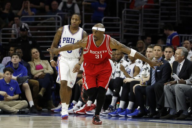 Houston Rockets' Jason Terry, right, reacts after making a three-pointer past Philadelphia 76ers' Isaiah Canaan during the second half of an NBA basketball game, Wednesday, March 9, 2016, in Philadelphia. Houston won 118-104. (AP Photo/Matt Slocum)