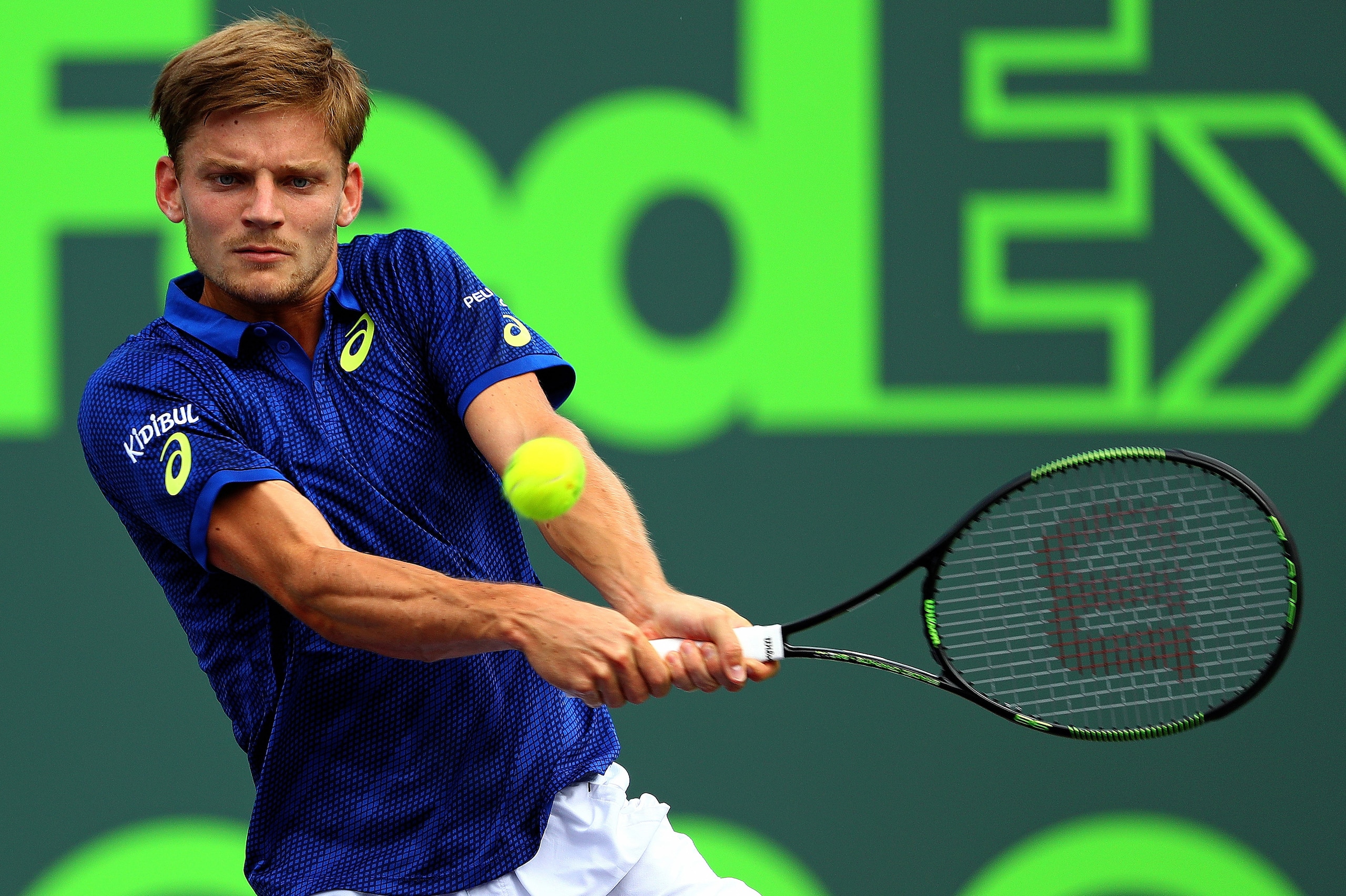 KEY BISCAYNE, FL - MARCH 30:  David Goffin of Belguim plays a match against Gilles Simon of France during Day 10 of the Miami Open presented by Itau at Crandon Park Tennis Center on March 30, 2016 in Key Biscayne, Florida.  (Photo by Mike Ehrmann/Getty Images)