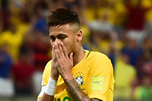 Brazil's Neymar gestures during the Russia 2018 FIFA World Cup South American Qualifiers' football match against Uruguay, in Recife, northeastern Brazil, on March 25, 2016.   AFP PHOTO / CHRISTOPHE SIMON / AFP / CHRISTOPHE SIMON        (Photo credit should read CHRISTOPHE SIMON/AFP/Getty Images)
