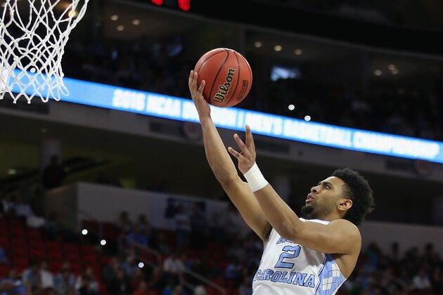 RALEIGH, NC - MARCH 19: Joel Berry II #2 of the North Carolina Tar Heels goes for a layup against the Providence Friars in the second half during the second round of the 2016 NCAA Men's Basketball Tournament at PNC Arena on March 19, 2016 in Raleigh, North Carolina.  The North Carolina Tar Heels won 85-66.  (Photo by Streeter Lecka/Getty Images)