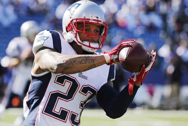 New England Patriots strong safety Patrick Chung (23) catches a pass before an NFL football game against the Buffalo Bills Sunday, Oct. 12, 2014, in Orchard Park, N.Y. (AP Photo/Mike Groll)