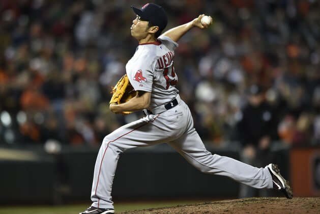 Boston Red Sox pitcher Koji Uehara delivers against the Baltimore Orioles in the ninth inning of a baseball game, Friday, April 24, 2015, in Baltimore. The red Sox won 7-5. (AP Photo/Gail Burton)