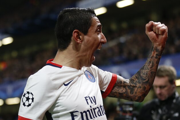PSG's Angel Di Maria celebrates after his teammate PSG's Zlatan Ibrahimovic scored his sides second goal of the game during their Champions League round of 16 second leg soccer match between Chelsea and Paris Saint Germain, at Stamford Bridge stadium in London, Wednesday, March, 9, 2016. (AP Photo/Frank Augstein)