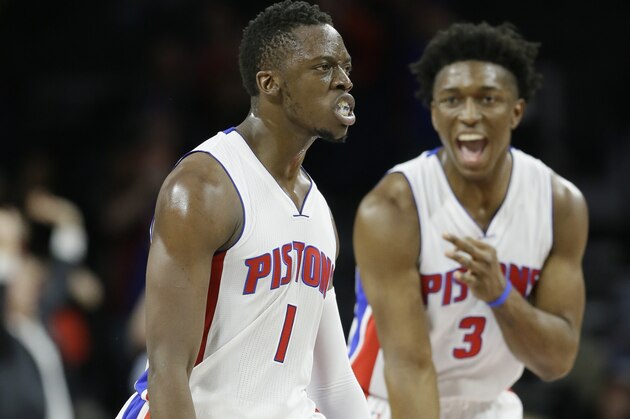 Detroit Pistons forward Stanley Johnson (3) runs towards guard Reggie Jackson (1) after Jackson's three point basket during the second half of an NBA basketball game against the Philadelphia 76ers, Wednesday, Jan. 27, 2016 in Auburn Hills, Mich. The Pistons defeated the 76ers 110-97. (AP Photo/Carlos Osorio)
