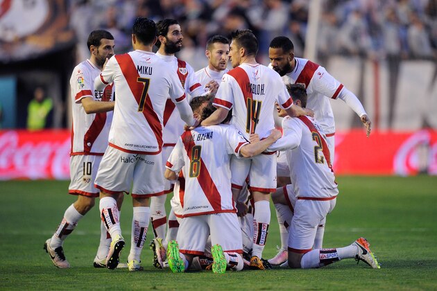 MADRID, SPAIN - APRIL 01:  Javi Guerra of Rayo Vallecano de Madrid celebrates with teammates after scoring his team's opening goal after having a goal disallowed earlier during the La Liga match between Rayo Vallecano and Getafe CF at Estadio de Vallecas on April 1, 2016 in Madrid, Spain. The goal was later disallowed for handball.  (Photo by Denis Doyle/Getty Images)