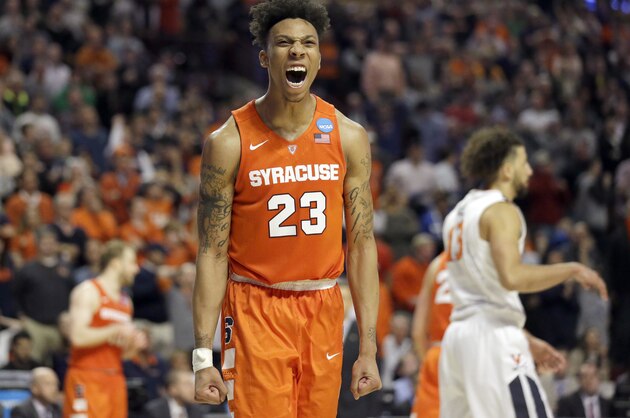 Syracuse's Malachi Richardson (23) reacts during the second half of a college basketball game against Virginia in the regional finals of the NCAA Tournament, Sunday, March 27, 2016, in Chicago. Syracuse won 68-62. (AP Photo/Nam Y. Huh)