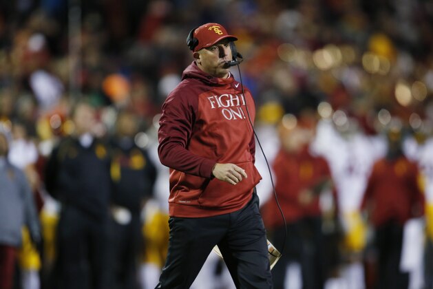 Southern California head coach Clay Helton in the second half of an NCAA college football game Friday, Nov. 13, 2015, in Boulder, Colo. Southern California won 27-24. (AP Photo/David Zalubowski) Southern California head coach Clay Helton in the second half of an NCAA college football game Friday, Nov. 13, 2015, in Boulder, Colo. Southern California won 27-24. (AP Photo/David Zalubowski)