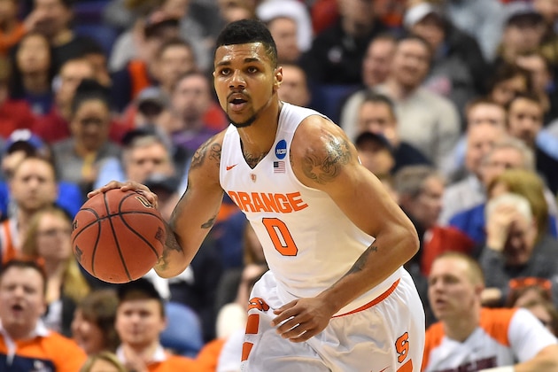 Mar 20, 2016; St. Louis, MO, USA; Syracuse Orange forward Michael Gbinije (0) brings the ball up court during the first half of the second round against the Middle Tennessee Blue Raiders in the 2016 NCAA Tournament at Scottrade Center. Mandatory Credit: Jasen Vinlove-USA TODAY Sports