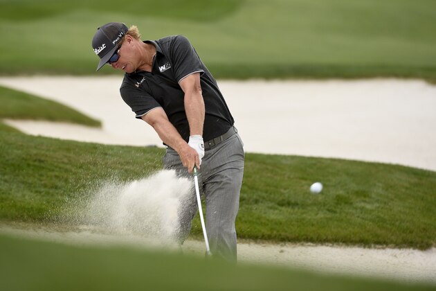 Charley Hoffman hits out of a fairway bunker on the 18th hole during the second round of the Houston Open golf tournament, Friday, April 1, 2016, in Humble, Texas. (AP Photo/Eric Christian Smith)