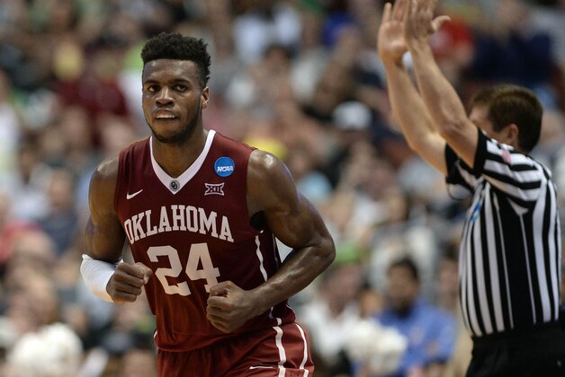 March 26, 2016; Anaheim, CA, USA; Oklahoma Sooners guard Buddy Hield (24) reacts after scoring a basket against Oregon Ducks during the second half of the West regional final of the NCAA Tournament at Honda Center. Mandatory Credit: Robert Hanashiro-USA TODAY Sports