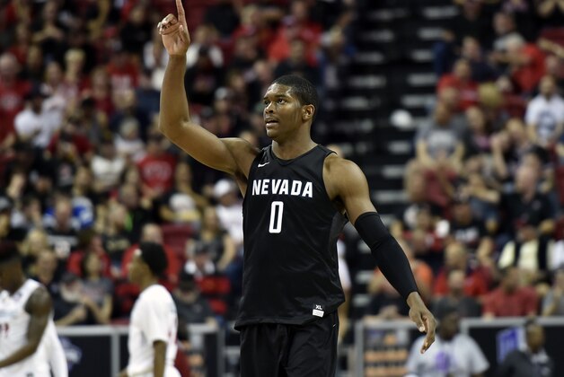 Nevada's Cameron Oliver gestures after scoring a basket during the second half of an NCAA college basketball game against San Diego State in the semifinals at the Mountain West Conference tournament Friday, March 11, 2016, in Las Vegas. San Diego State won 67-55. (AP Photo/David Becker)