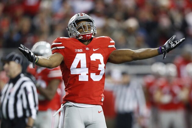 Nov 7, 2015; Columbus, OH, USA; Ohio State Buckeyes linebacker Darron Lee (43) gets the crowd fired up during first quarter action versus the Minnesota Golden Gophers at Ohio Stadium. Ohio State leads 14-0 at halftime. Mandatory Credit: Joe Maiorana-USA TODAY Sports