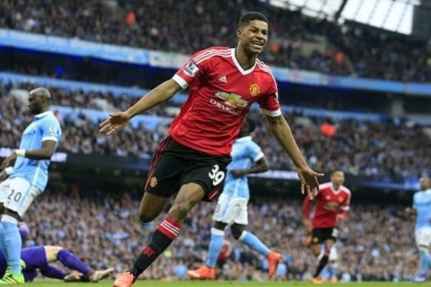 United’s Marcus Rashford celebrates after scoring his side's first goal during the English Premier League soccer match between Manchester City and Manchester United at the Etihad stadium in Manchester, Sunday, March 20, 2016.(AP Photo/Jon Super)
