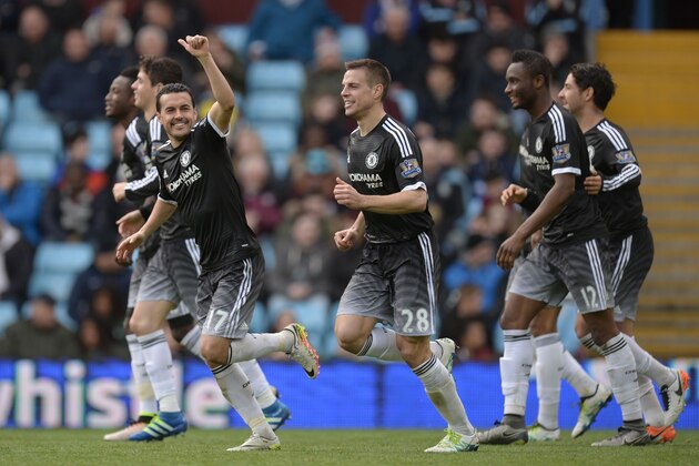 Chelsea's Spanish midfielder Pedro (L) celebrates after scoring his first goal during the English Premier League football match between Aston Villa and Chelsea at Villa Park in Birmingham, central England on April 2, 2016. / AFP / OLI SCARFF / RESTRICTED TO EDITORIAL USE. No use with unauthorized audio, video, data, fixture lists, club/league logos or 'live' services. Online in-match use limited to 75 images, no video emulation. No use in betting, games or single club/league/player publications.  /         (Photo credit should read OLI SCARFF/AFP/Getty Images)