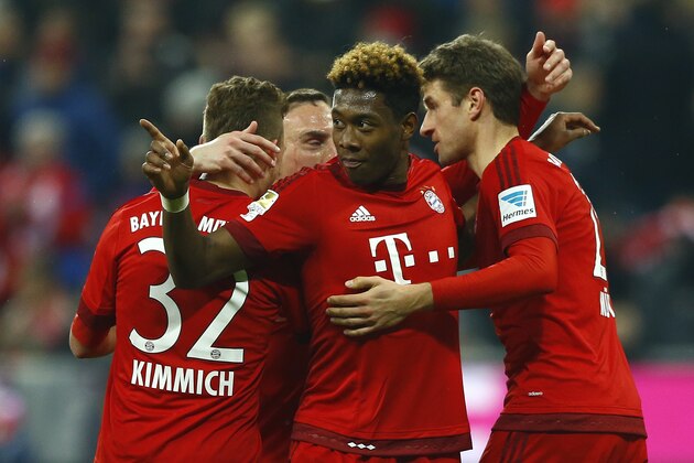 Bayern's Thomas Mueller, right, celebrates with teammates Joshua Kimmich, left, Franck Ribery, background, and David Alaba after scoring his side's third goal during the German Bundesliga soccer match between FC Bayern Munich and SV Werder Bremen at the Allianz Arena stadium in Munich, Germany, Saturday, March 12, 2016. (AP Photo/Matthias Schrader)