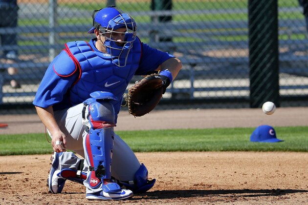 Chicago Cubs catcher Miguel Montero runs drills during a spring training baseball practice, Wednesday, Feb. 24, 2016, in Mesa, Ariz.  (AP Photo/Matt York)