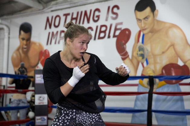 Mixed martial arts fighter Ronda Rousey trains at Glendale Fighting Club, Wednesday, July 15, 2015, in Glendale, Calif. Rousey, the UFC bantamweight champion, will return to the octagon against Brazil’s unbeaten Bethe Correia at UFC 190 in Rio de Janeiro on Aug. 1. (AP Photo/Jae C. Hong)