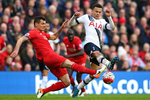 LIVERPOOL, ENGLAND - APRIL 02: Dele Alli of Tottenham Hotspur and Dejan Lovren of Liverpool compete for the ball during the Barclays Premier League match between Liverpool and Tottenham Hotspur at Anfield on April 2, 2016 in Liverpool, England.  (Photo by Alex Livesey/Getty Images)