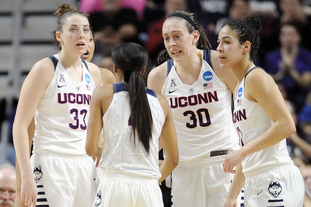 Connecticut’s Breanna Stewart (30) talks to teammates Katie Lou Samuelson (33), Moriah Jefferson, second from left, and Kia Nurse, right, during the first half of a college basketball game against Texas in the regional final of the women's NCAA Tournament, Monday, March 28, 2016, in Bridgeport, Conn. (AP Photo/Jessica Hill)