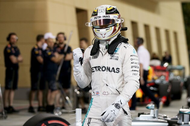 SAKHIR, BAHRAIN - APRIL 02: Lewis Hamilton of Great Britain and Mercedes GP celebrates his pole position in parc ferme during qualifying for the Bahrain Formula One Grand Prix at Bahrain International Circuit on April 2, 2016 in Sakhir, Bahrain.  (Photo by Lars Baron/Getty Images)