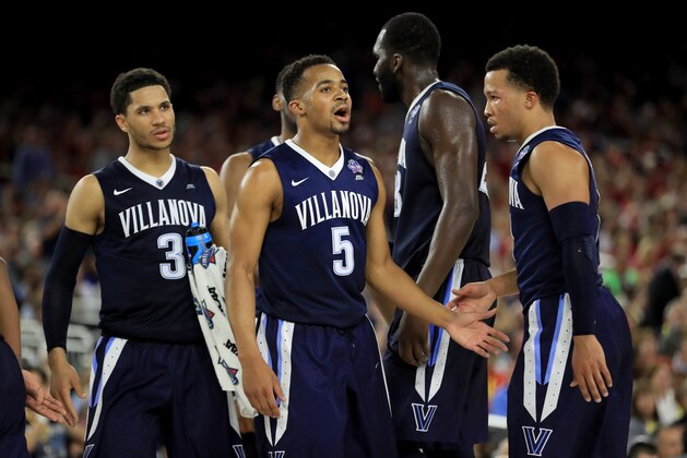 HOUSTON, TEXAS - APRIL 02:  Phil Booth #5 and Jalen Brunson #1 of the Villanova Wildcats react in the second half against the Oklahoma Sooners during the NCAA Men's Final Four Semifinal at NRG Stadium on April 2, 2016 in Houston, Texas.  (Photo by Ronald Martinez/Getty Images)